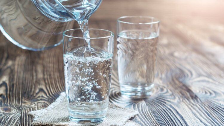 a glass of water for a drinking regimen